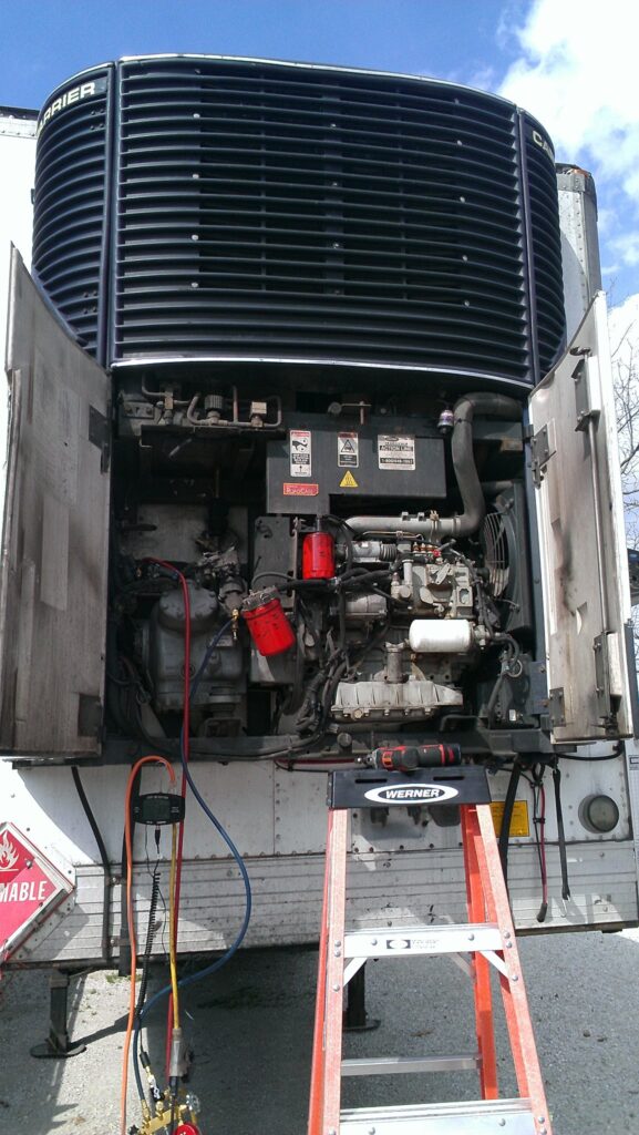 HVAC Master LLC technician servicing residential AC unit, trusted contractor on-site