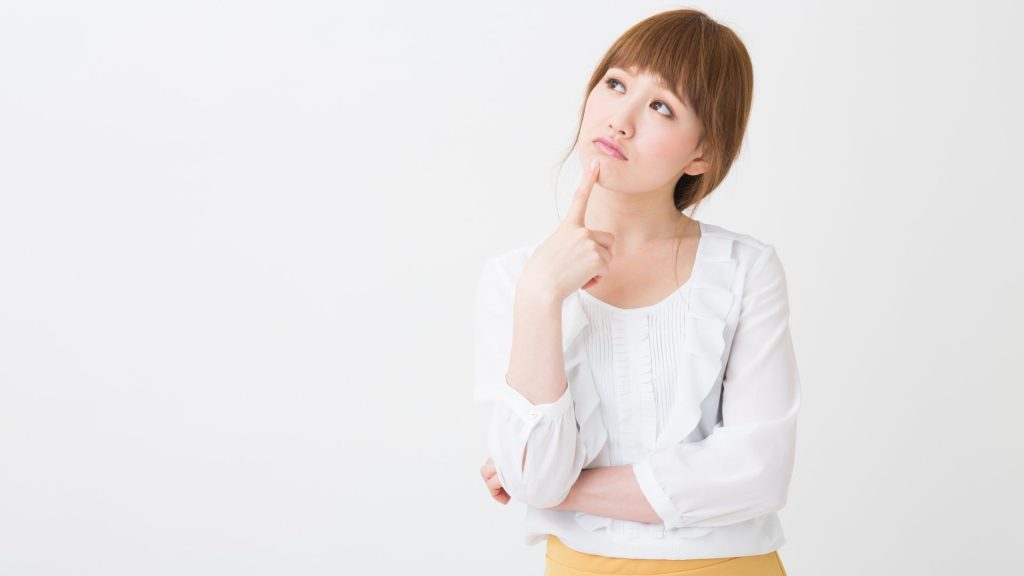 Technician from HVAC Master Heating & Air Conditioning LLC servicing Carrier and Trane HVAC system indoors